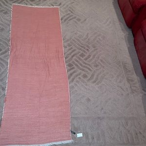 Bloomingdales’s 6’ long rose and cream scarf. Wool blend, but no “materials tag”